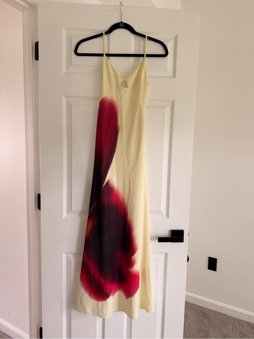 Yellow satin gown with floral accent